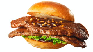 Japanese Fast Food Restaurant Sticks Two Steaks Between Buns<em></em>